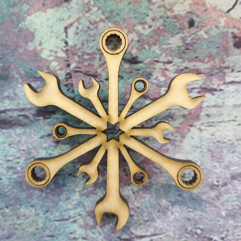This is a Wrench Snowflake design laser cut out of wood