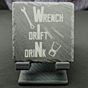 Natural Slate Coaster engraved with the saying "wrench, drift, drink" with the letters spelling out WIN down the center in bold