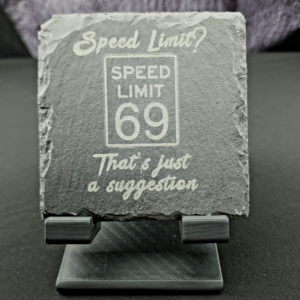 Natural Slate Coaster with the image of a speed limit sign showing "69" in the middle and the saying "Speed Limit? That's just a suggestion"